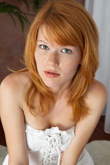 Gorgeous teen in striped stockings