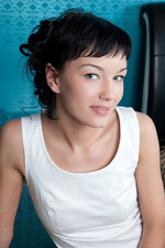 Sweet brunette smiles at you