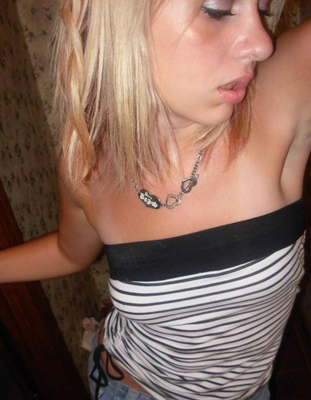 Blonde amateur girl being shy - Pic #01