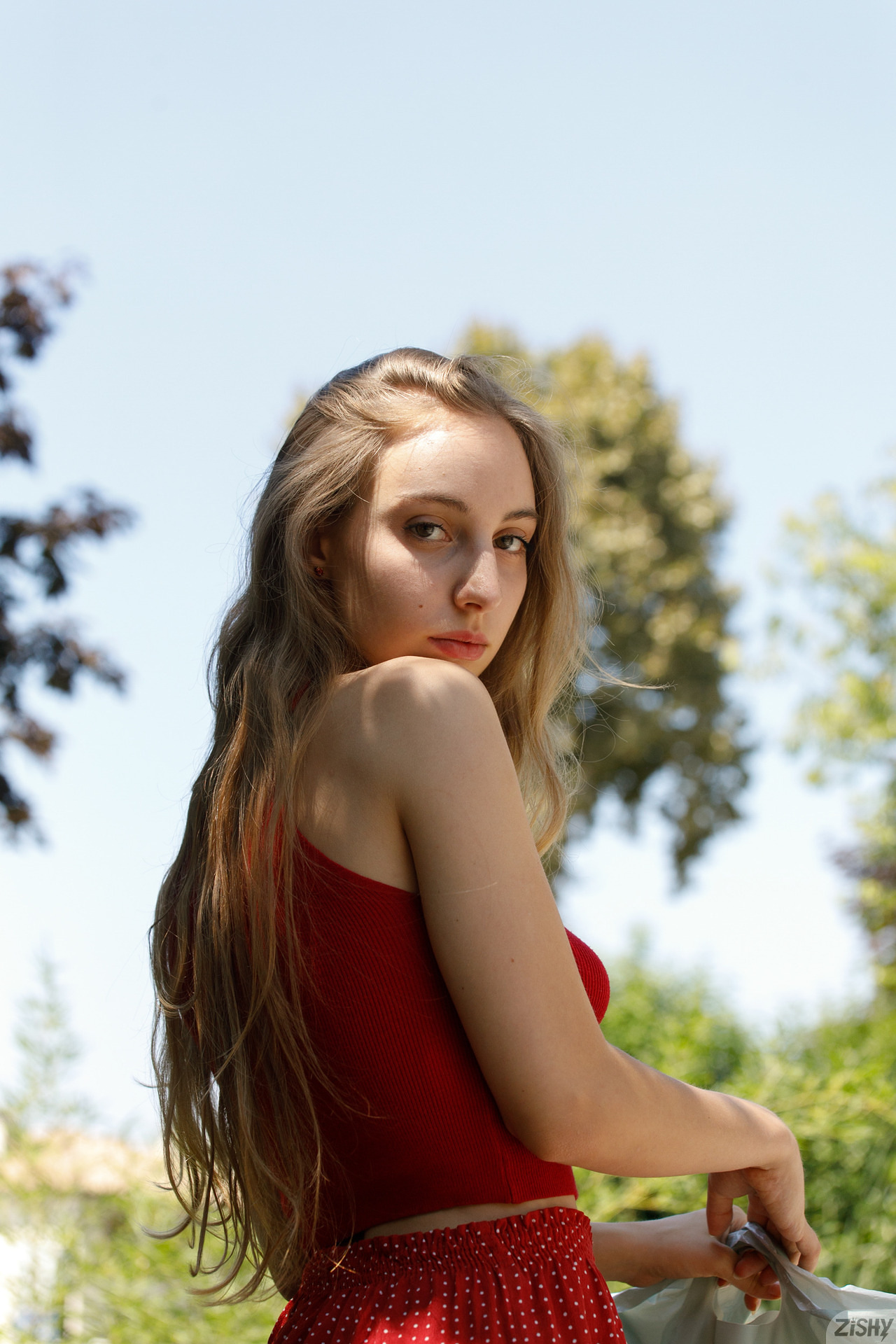 'Red Ferraris' with Claudia Veneza via Zishy - Pic #1
